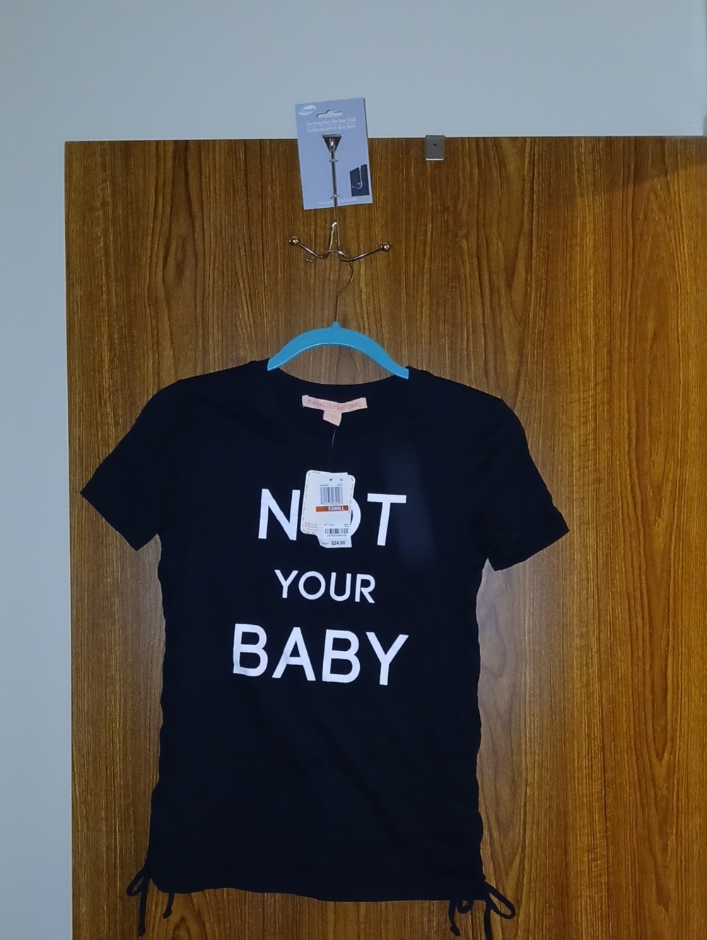 Rebellious One Black Tee with White 'NOT YOUR BABY' Graphic